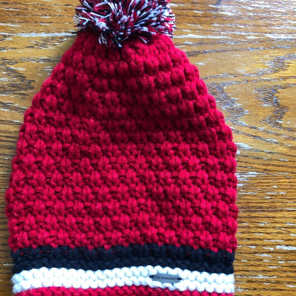 Steve Madden Red, Black, and White Pom Pom Beanie.